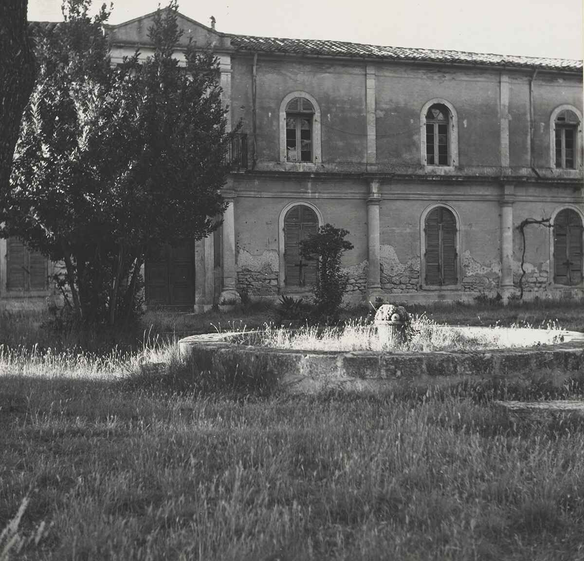 Monastery Saint Paul de Mausole with old fountain Saint Remy de Provence copy